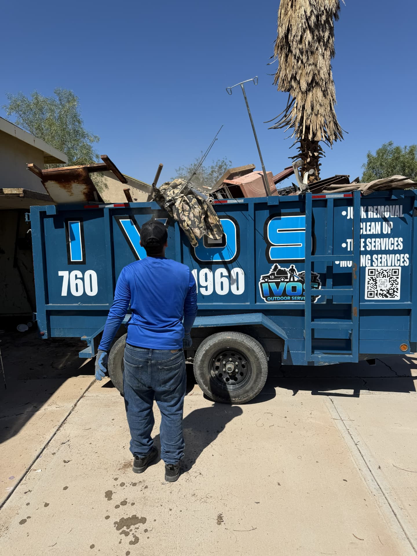 IVOS trailer loaded during a junk removal job